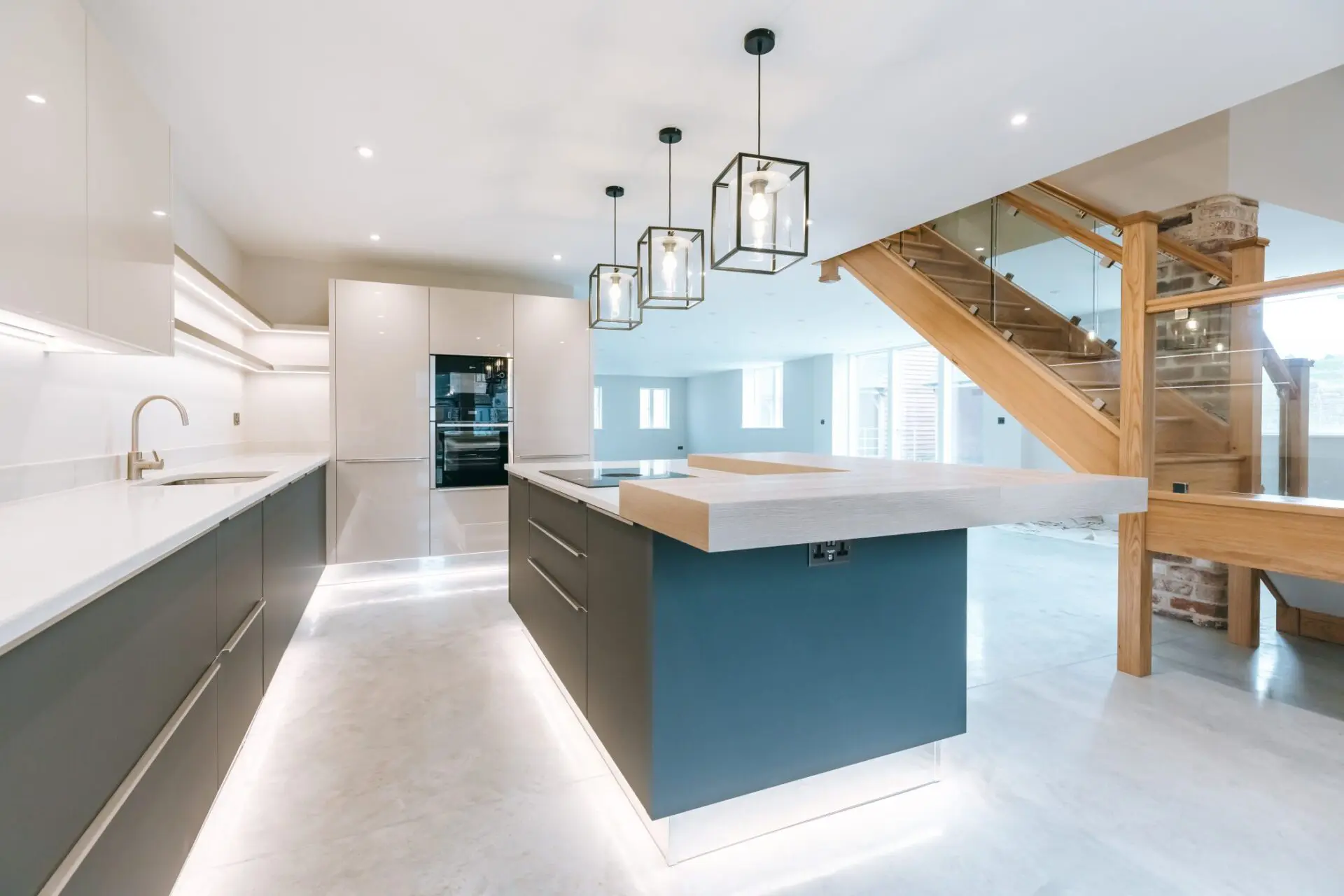 Concrete And Metal Finish Cabinetry Combined With Solid Oak Details For An Organic Industrial Kitchen Look