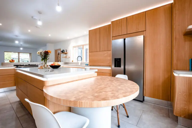 Curved Kitchen Island With Raised Breakfast Area
