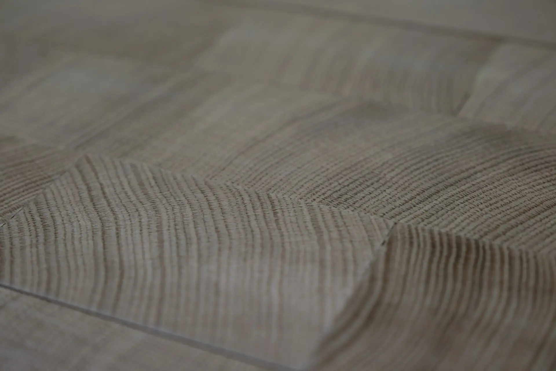 Detailed Close Up Of Natural Wood Grain Showcasing Sustainable Materials Used In Hygge Kitchens