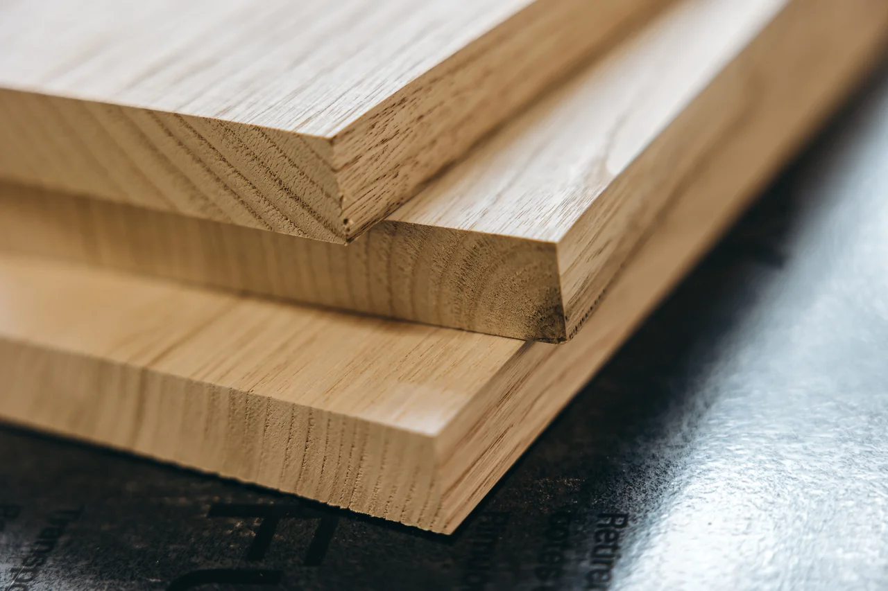 Selected timber and finishes for bespoke joinery, chosen for stability, provenance and how the surface will age.